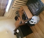 3 boxes, few bags, bike, computer, books, clothes, 1 small bedside table